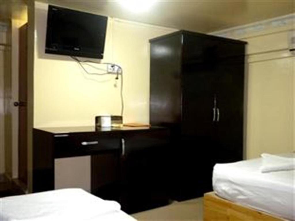 Golden Boat Guesthouse Phnom Penh Zimmer foto